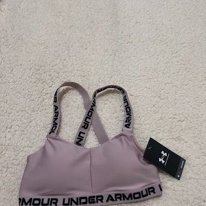Under amour cross back mid bra. Perfect condition. New with tags. Brand new.
